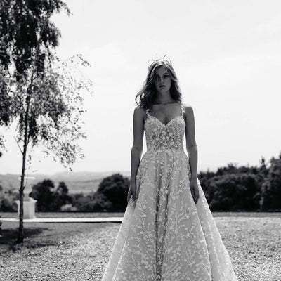A-line ballgown silhouette with a sweetheart bodice and lace spaghetti straps.