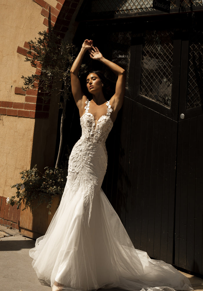Louise dress with sweetheart neckline, floral straps and mermaid silhouette with beaded lace and soft tulle train.