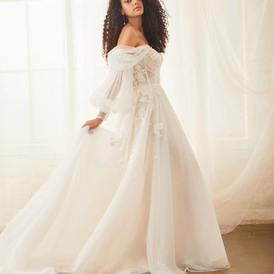 Model wearing Sky wedding dress