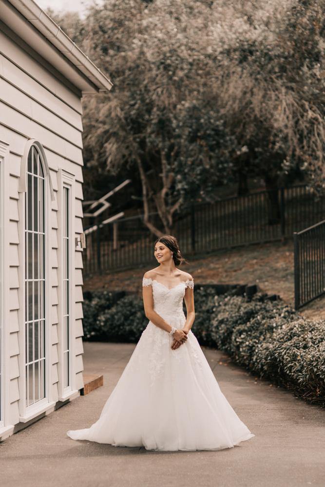 Model wearing Ladina wedding gown