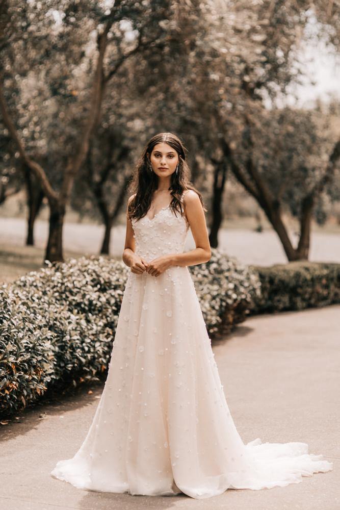 Model wearing Lyris wedding gown
