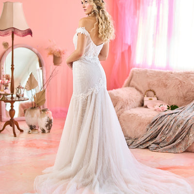 Model wearing Sara wedding dress with bubble sleeves from the Mademoiselle collection