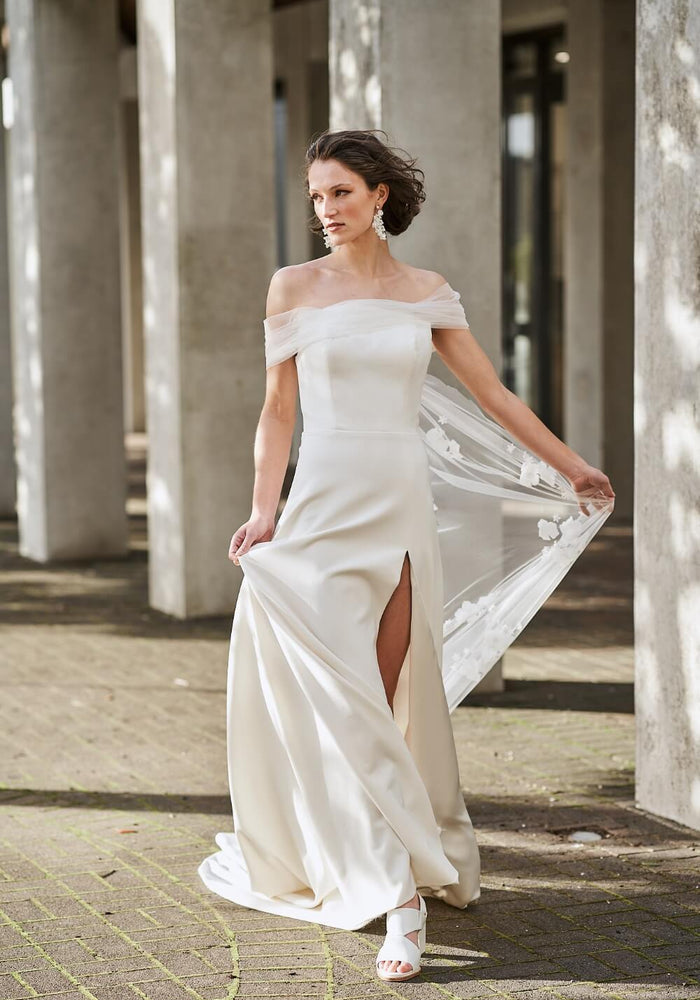 Model wearing Sabrina wedding gown